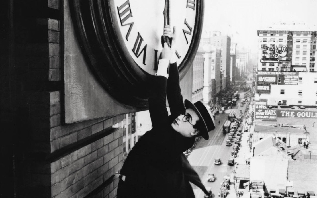 Harold Lloyd hanging from clock film scene